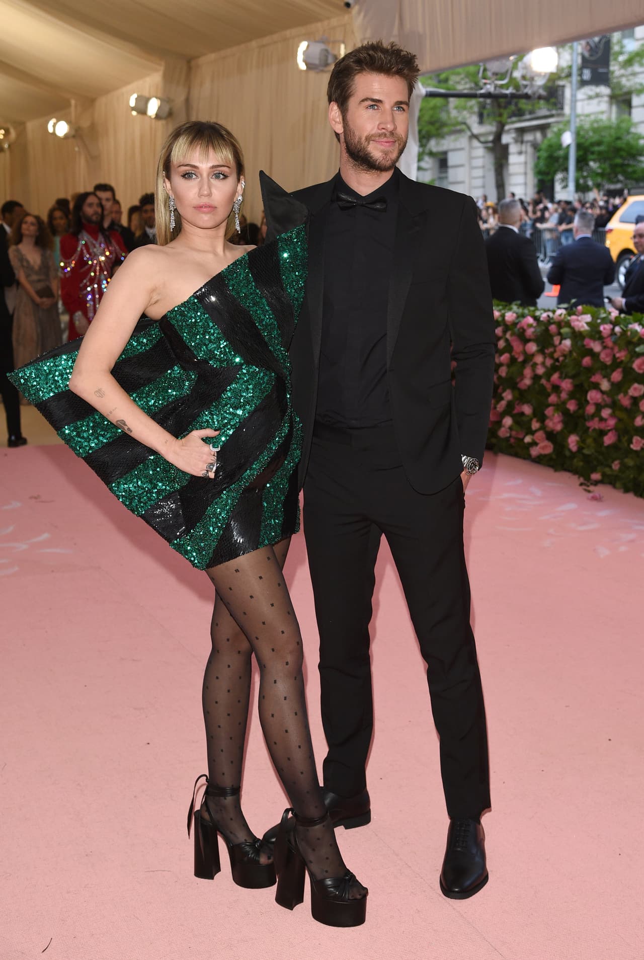 Miley Cyrus, left, and Liam Hemsworth attend The Metropolitan Museum of Art's Costume Institute benefit gala celebrating the opening of the "Camp: Notes on Fashion" exhibition on Monday, May 6, 2019, in New York. (Photo by Evan Agostini/Invision/AP)